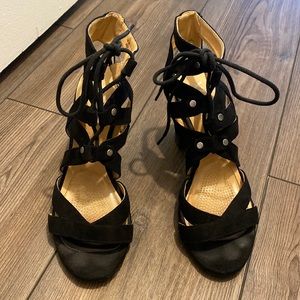 Lace up XOXO sandals like brand new with brand new lifts